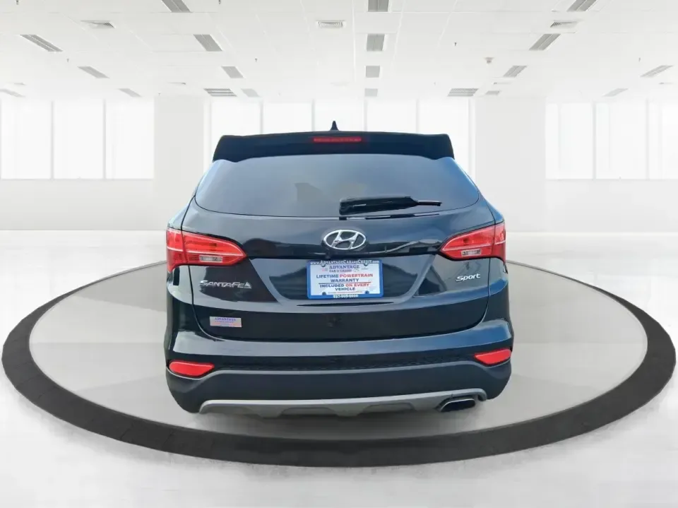 2015 Hyundai Santa Fe 2.4L (5XYZU3LB1FG) with an Theta II 2.4L I-4 gasoline direct injection engine, 6-Speed Automatic transmission, located at 1099 N County Rd 25A , Troy, OH, 45373, (937) 908-9800, 40.057079, -84.212883 - Pack up the kids for a weekend at Treasure Island Park, load the cooler for a day on the Great Miami River, or settle into a comfortable daily commute down I75-this 2015 Hyundai Santa Fe 2.4L is the kind of practical SUV that fits real life in Troy. With confident road manners, flexible cargo space, - Photo#3