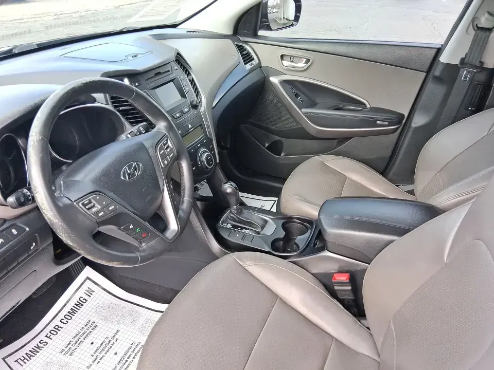 2015 Hyundai Santa Fe 2.4L (5XYZU3LB1FG) with an Theta II 2.4L I-4 gasoline direct injection engine, 6-Speed Automatic transmission, located at 1099 N County Rd 25A , Troy, OH, 45373, (937) 908-9800, 40.057079, -84.212883 - Pack up the kids for a weekend at Treasure Island Park, load the cooler for a day on the Great Miami River, or settle into a comfortable daily commute down I75-this 2015 Hyundai Santa Fe 2.4L is the kind of practical SUV that fits real life in Troy. With confident road manners, flexible cargo space, - Photo#9