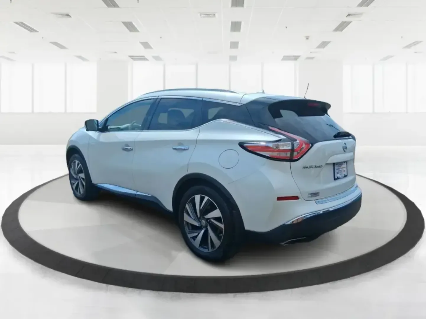 2015 Nissan Murano Platinum (5N1AZ2MH3FN) with an 3.5L V-6 DOHC engine, Continuously Variable Transmission transmission, located at 1951 S Dayton Lakeview Rd., New Carlisle, OH, 45344, (937) 908-9800, 39.890999, -84.050255 - Need one SUV that can handle the weekday commute, keep everyone comfortable on family errands, and still feel upscale for a weekend getaway to John Bryan State Park or a day trip through Dayton? This 2015 Nissan Murano Platinum AWD in Pearl White is built for exactly that kind of real-life driving-s - Photo#4