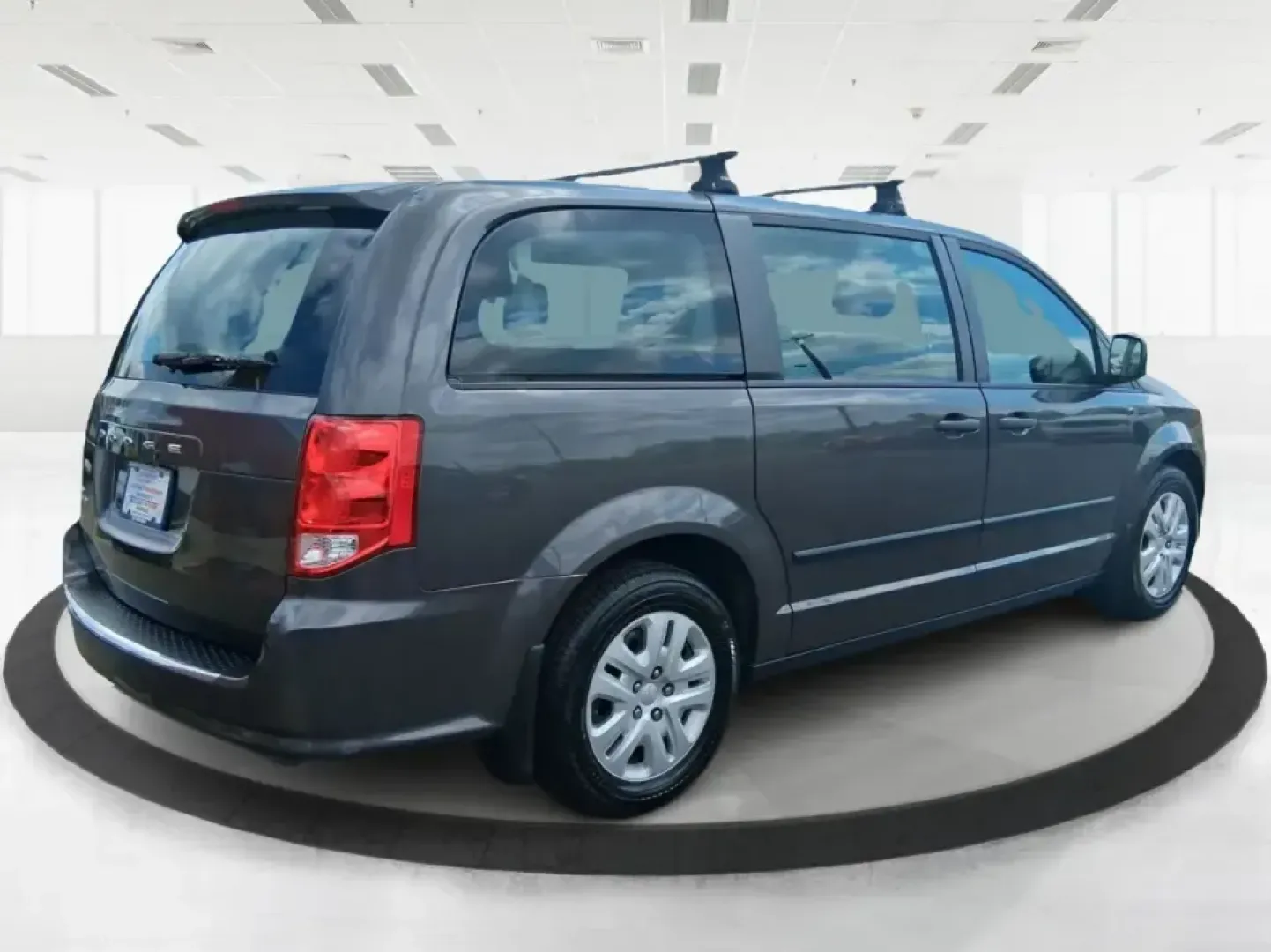 2015 Dodge Grand Caravan American Value Pkg (2C4RDGBG3FR) with an 3.6L V-6 DOHC engine, 6-Speed Automatic transmission, located at 4508 South Dixie Dr, Moraine, OH, 45439, (937) 908-9800, 39.689976, -84.218452 - Road trips to Caesar Creek, school drop-offs through Kettering, and everyday errands up and down South Dixie Drive feel a lot easier when you've got a spacious minivan that's built for real life. This **2015 Dodge Grand Caravan American Value Pkg** is a practical, family-focused van that fits busy s- Photo#2