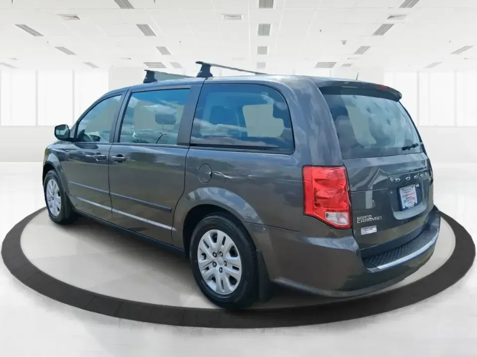 2015 Dodge Grand Caravan American Value Pkg (2C4RDGBG3FR) with an 3.6L V-6 DOHC engine, 6-Speed Automatic transmission, located at 4508 South Dixie Dr, Moraine, OH, 45439, (937) 908-9800, 39.689976, -84.218452 - Road trips to Caesar Creek, school drop-offs through Kettering, and everyday errands up and down South Dixie Drive feel a lot easier when you've got a spacious minivan that's built for real life. This **2015 Dodge Grand Caravan American Value Pkg** is a practical, family-focused van that fits busy s - Photo#4