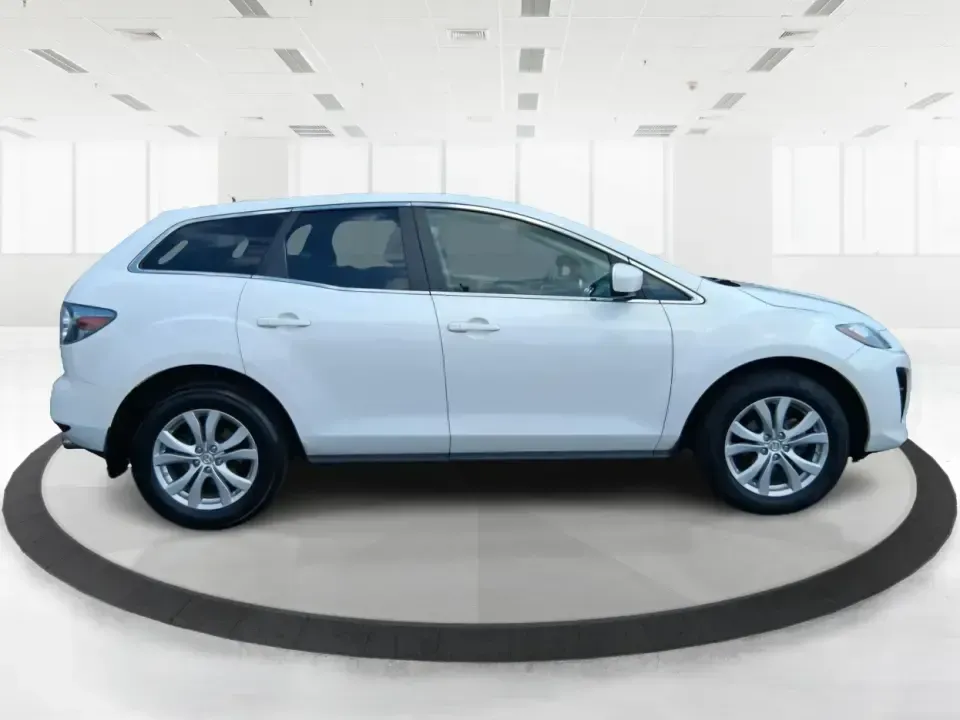 2010 Mazda CX-7 s Touring (JM3ER4W33A0) with an 2.3L I-4 gasoline direct injection engine, 6-Speed Automatic transmission, located at 1099 N County Rd 25A , Troy, OH, 45373, (937) 908-9800, 40.057079, -84.212883 - Picture your next weekend: loading up the cargo area for a day at Miami County Park, cruising up I75 for a quick getaway, or confidently handling Ohio's surprise rain and winter slush on the school run. This 2010 Mazda CX7 s Touring is the kind of sporty, practical SUV that fits real life in Troy-ea - Photo#1