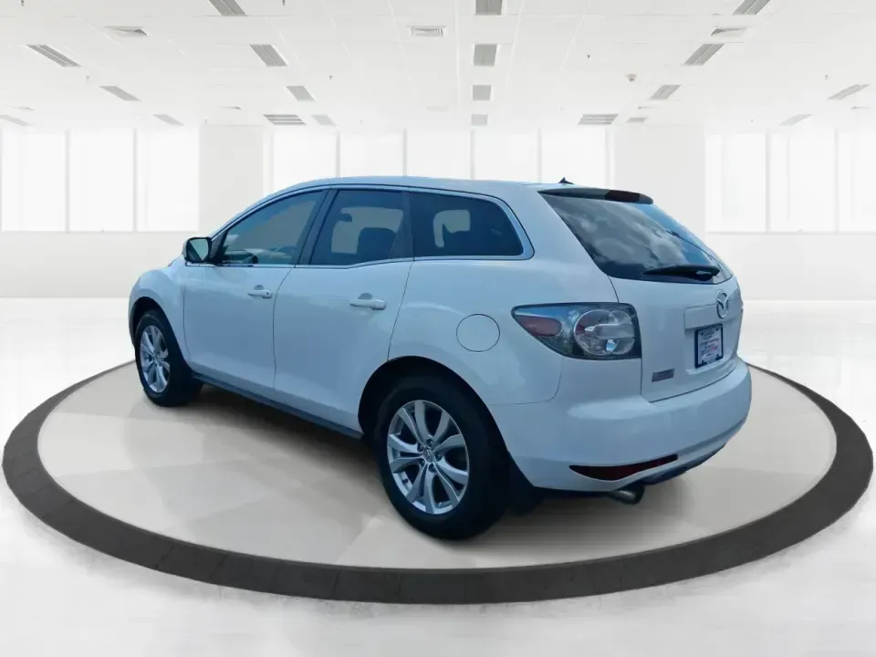 2010 Mazda CX-7 s Touring (JM3ER4W33A0) with an 2.3L I-4 gasoline direct injection engine, 6-Speed Automatic transmission, located at 1099 N County Rd 25A , Troy, OH, 45373, (937) 908-9800, 40.057079, -84.212883 - Picture your next weekend: loading up the cargo area for a day at Miami County Park, cruising up I75 for a quick getaway, or confidently handling Ohio's surprise rain and winter slush on the school run. This 2010 Mazda CX7 s Touring is the kind of sporty, practical SUV that fits real life in Troy-ea - Photo#4