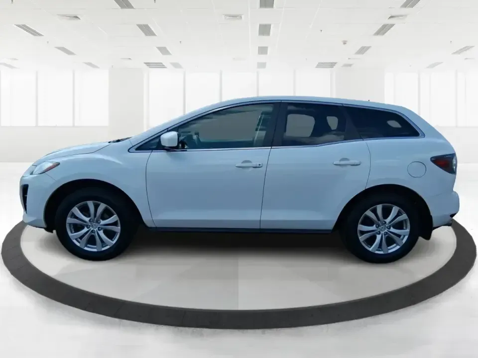 2010 Mazda CX-7 s Touring (JM3ER4W33A0) with an 2.3L I-4 gasoline direct injection engine, 6-Speed Automatic transmission, located at 1099 N County Rd 25A , Troy, OH, 45373, (937) 908-9800, 40.057079, -84.212883 - Picture your next weekend: loading up the cargo area for a day at Miami County Park, cruising up I75 for a quick getaway, or confidently handling Ohio's surprise rain and winter slush on the school run. This 2010 Mazda CX7 s Touring is the kind of sporty, practical SUV that fits real life in Troy-ea - Photo#5
