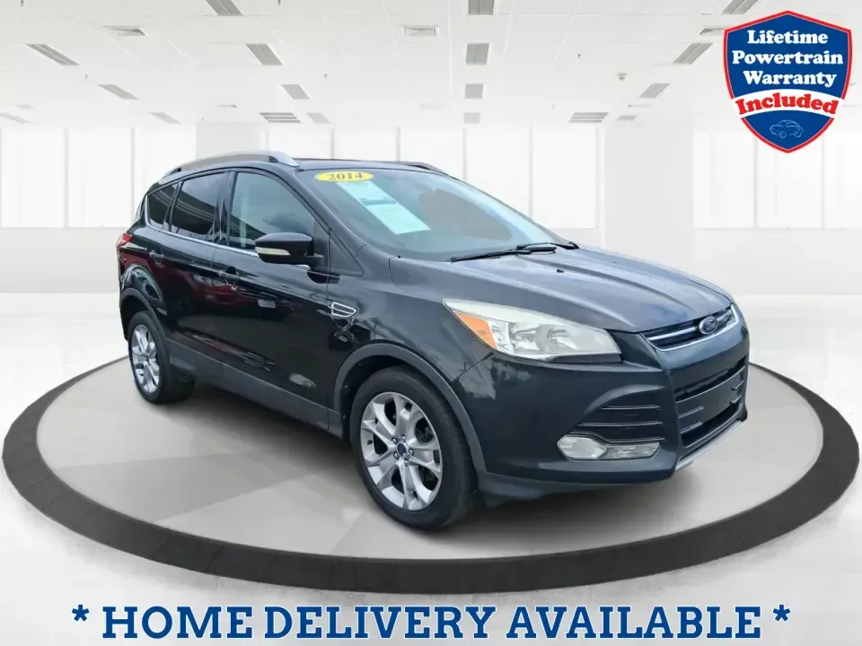 2014 Ford Escape Titanium (1FMCU9J99EU) with an 2.0L L4 DOHC 16V engine, 6-Speed Automatic transmission, located at 1099 N County Rd 25A , Troy, OH, 45373, (937) 908-9800, 40.057079, -84.212883 - Need one SUV that can handle an Ohio winter commute, school drop-offs, and a spontaneous weekend road trip to Hocking Hills without feeling like a compromise? This 2014 Ford Escape Titanium 4WD in sleek Tuxedo Black is built for real life in Troy-comfortable for long drives, confident in bad weather - Photo#0