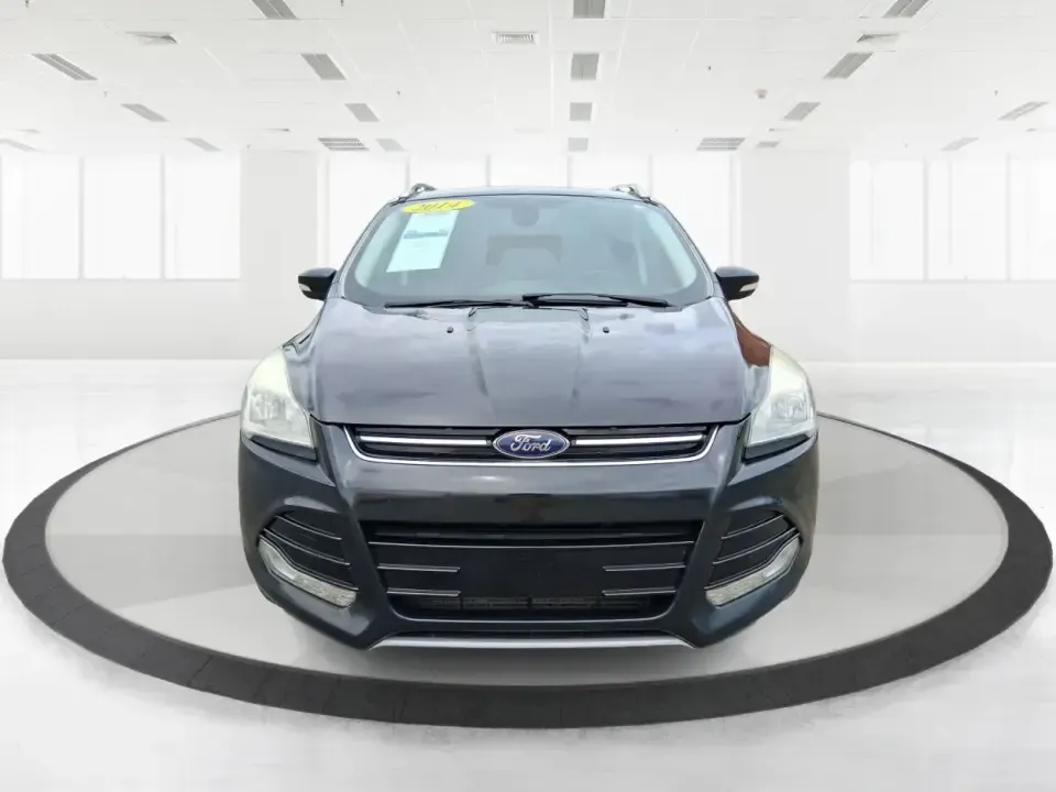 2014 Ford Escape Titanium (1FMCU9J99EU) with an 2.0L L4 DOHC 16V engine, 6-Speed Automatic transmission, located at 1099 N County Rd 25A , Troy, OH, 45373, (937) 908-9800, 40.057079, -84.212883 - Need one SUV that can handle an Ohio winter commute, school drop-offs, and a spontaneous weekend road trip to Hocking Hills without feeling like a compromise? This 2014 Ford Escape Titanium 4WD in sleek Tuxedo Black is built for real life in Troy-comfortable for long drives, confident in bad weather - Photo#7