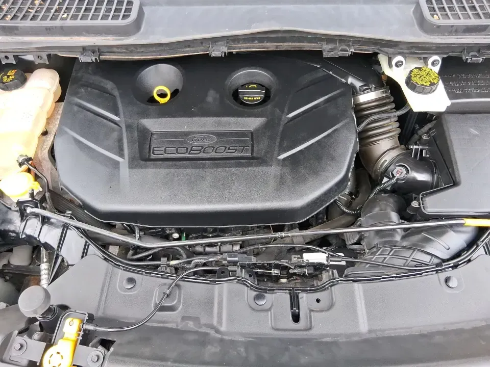 2014 Ford Escape Titanium (1FMCU9J99EU) with an 2.0L L4 DOHC 16V engine, 6-Speed Automatic transmission, located at 1099 N County Rd 25A , Troy, OH, 45373, (937) 908-9800, 40.057079, -84.212883 - Need one SUV that can handle an Ohio winter commute, school drop-offs, and a spontaneous weekend road trip to Hocking Hills without feeling like a compromise? This 2014 Ford Escape Titanium 4WD in sleek Tuxedo Black is built for real life in Troy-comfortable for long drives, confident in bad weather - Photo#11