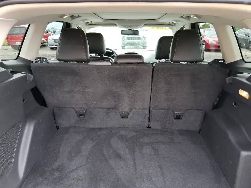 2014 Ford Escape Titanium (1FMCU9J99EU) with an 2.0L L4 DOHC 16V engine, 6-Speed Automatic transmission, located at 1099 N County Rd 25A , Troy, OH, 45373, (937) 908-9800, 40.057079, -84.212883 - Need one SUV that can handle an Ohio winter commute, school drop-offs, and a spontaneous weekend road trip to Hocking Hills without feeling like a compromise? This 2014 Ford Escape Titanium 4WD in sleek Tuxedo Black is built for real life in Troy-comfortable for long drives, confident in bad weather - Photo#12