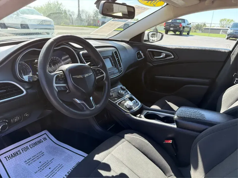 2016 Chrysler 200 Limited (1C3CCCABXGN) with an 2.4L L4 DOHC 16V engine, 9A transmission, located at 1184 Kauffman Ave, Fairborn, OH, 45324, (937) 908-9800, 39.807072, -84.030914 - Need a comfortable, efficient sedan for daily commuting to Wright-Patterson AFB, weekend trips to Yellow Springs, or school-and-sports carpools around Fairborn? This 2016 Chrysler 200 Limited delivers the kind of smooth ride, upscale cabin feel, and highway-friendly MPG that fits real life in the Mi- Photo#9