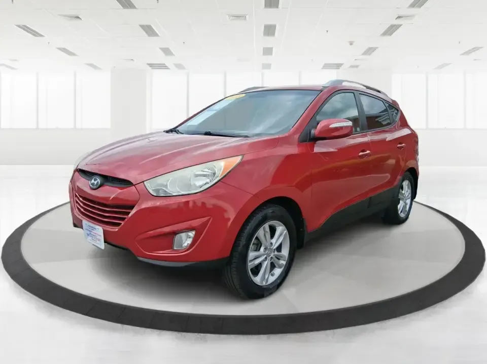 2013 Hyundai Tucson GLS (KM8JUCAC7DU) with an Theta II 2.4L I-4 DOHC engine, 6-Speed Automatic transmission, located at 1951 S Dayton Lakeview Rd., New Carlisle, OH, 45344, (937) 908-9800, 39.890999, -84.050255 - Need a dependable SUV that can handle Ohio weather, school drop-offs, and weekend getaways without stretching your budget? This 2013 Hyundai Tucson GLS in eye-catching Garnet Red is built for real life-comfortable for daily commuting, confident on slick winter roads, and practical for everything fro - Photo#8