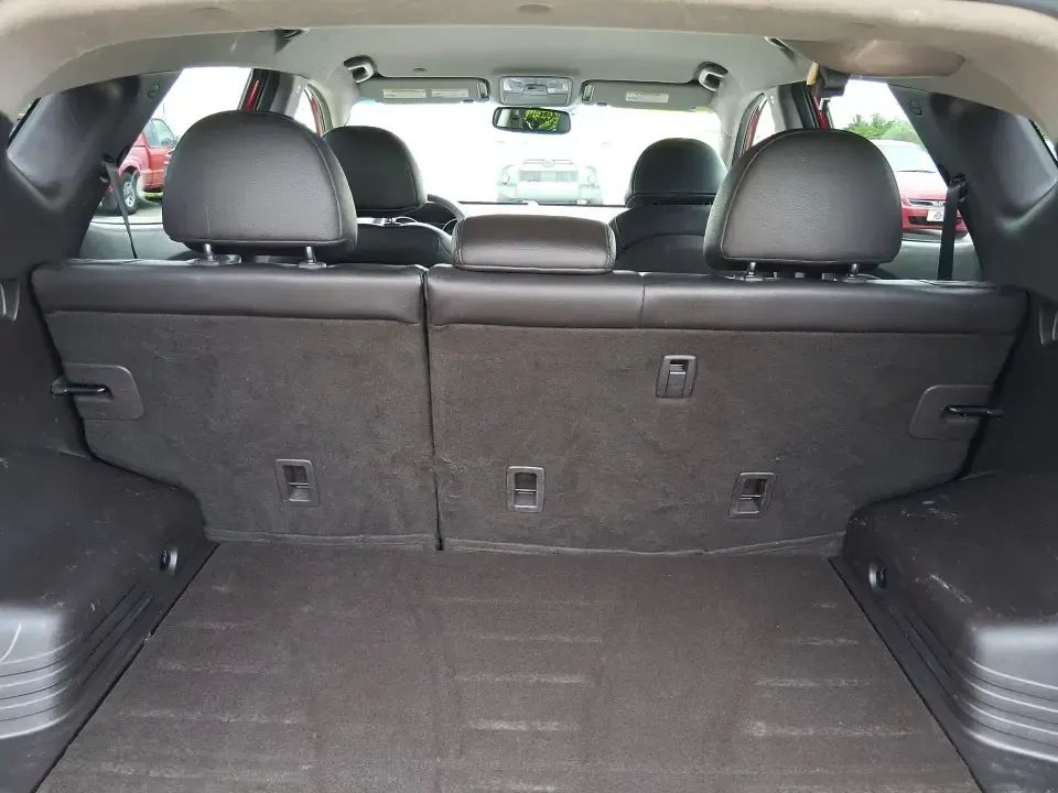 2013 Hyundai Tucson GLS (KM8JUCAC7DU) with an Theta II 2.4L I-4 DOHC engine, 6-Speed Automatic transmission, located at 1951 S Dayton Lakeview Rd., New Carlisle, OH, 45344, (937) 908-9800, 39.890999, -84.050255 - Need a dependable SUV that can handle Ohio weather, school drop-offs, and weekend getaways without stretching your budget? This 2013 Hyundai Tucson GLS in eye-catching Garnet Red is built for real life-comfortable for daily commuting, confident on slick winter roads, and practical for everything fro - Photo#12