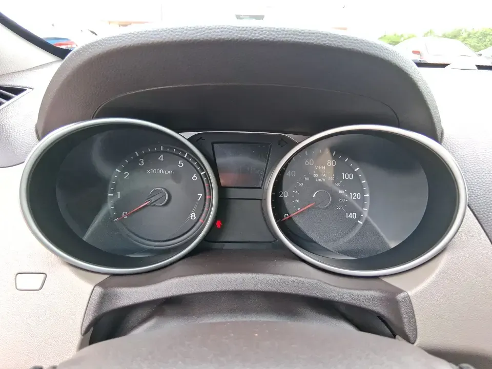 2013 Hyundai Tucson GLS (KM8JUCAC7DU) with an Theta II 2.4L I-4 DOHC engine, 6-Speed Automatic transmission, located at 1951 S Dayton Lakeview Rd., New Carlisle, OH, 45344, (937) 908-9800, 39.890999, -84.050255 - Need a dependable SUV that can handle Ohio weather, school drop-offs, and weekend getaways without stretching your budget? This 2013 Hyundai Tucson GLS in eye-catching Garnet Red is built for real life-comfortable for daily commuting, confident on slick winter roads, and practical for everything fro - Photo#15