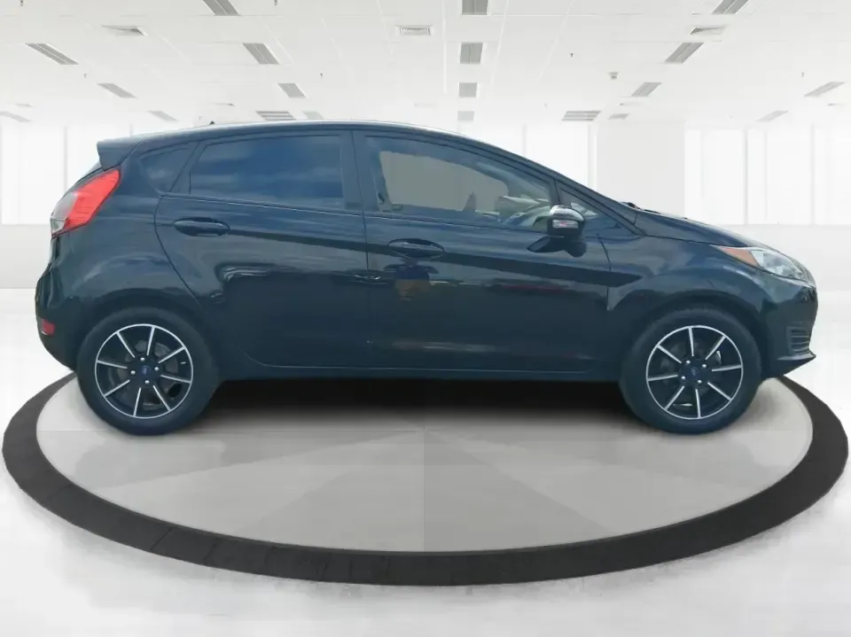 2019 Ford Fiesta SE (3FADP4EJ8KM) with an 1.6L I-4 DOHC engine, located at 401 Woodman Dr, Riverside, OH, 45431, (937) 908-9800, 39.760899, -84.123421 - Need a smart, easy-to-park hatchback for busy Riverside life-whether you're commuting down I-675, running errands near Wright-Patterson AFB, or squeezing into tight spots around The Greene in Beavercreek? This 2019 Ford Fiesta SE Hatchback in Shadow Black is built for real-world driving: efficient, - Photo#1