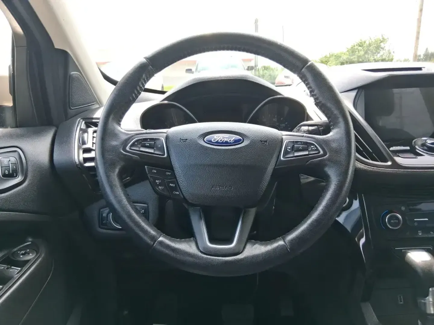2017 Ford Escape Titanium (1FMCU9JD2HU) with an 1.5L L4 DOHC 16V engine, 6A transmission, located at 1230 East Main St, Xenia, OH, 45385, (937) 908-9800, 39.688026, -83.910172 - Whether you're a busy commuter running up and down US-35, a growing family juggling school drop-offs, or a weekend explorer heading out toward John Bryan State Park, this 2017 Ford Escape Titanium is the kind of compact SUV that fits real life in Xenia. With confident AWD capability, upscale comfort- Photo#16