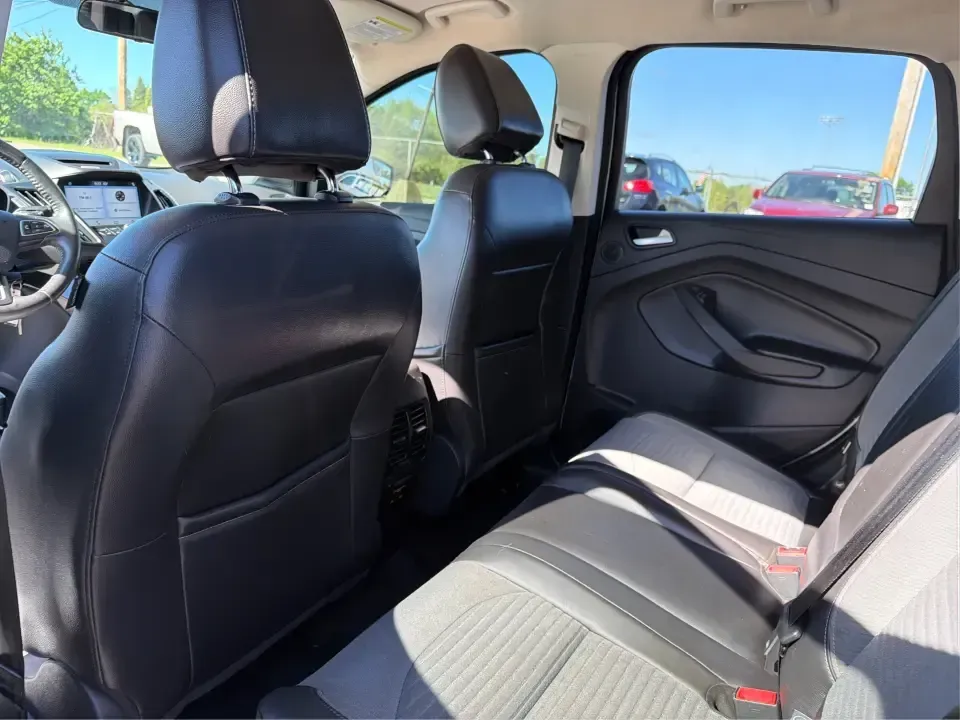 2017 Ford Escape SE (1FMCU0GD2HU) with an 1.5L L4 DOHC 16V engine, 6A transmission, located at 401 Woodman Dr, Riverside, OH, 45431, (937) 908-9800, 39.760899, -84.123421 - Picture a weekday that starts with a smooth commute up N County Rd 25A, turns into easy school drop-offs, and ends with a weekend escape to Indian Lake or a quick run down I75 for shopping and dinner-this 2017 Ford Escape SE is built for real life in and around Piqua, Ohio. Finished in standout Whit - Photo#10