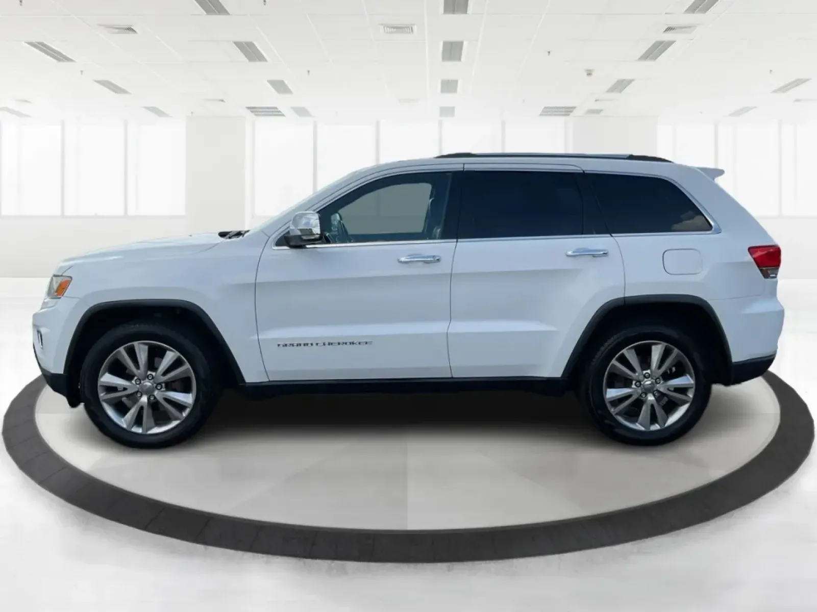 2014 Jeep Grand Cherokee Limited (1C4RJFBGXEC) with an Other engine, located at 1099 N County Rd 25A , Troy, OH, 45373, (937) 908-9800, 40.057079, -84.212883 - **Adventure Awaits: 2014 Jeep Grand Cherokee Limited Perfect for Your Next Family Road Trip!**<br /> <br /> Are you ready to embark on your next adventure? The 2014 Jeep Grand Cherokee Limited is here to elevate your driving experience, whether you're navigating the bustling streets of Fairborn, OH - Photo#5
