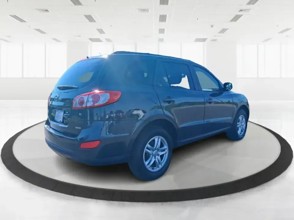 2012 Hyundai Santa Fe GLS (5XYZGDABXCG) with an 2.4L I-4 DOHC engine, 6-Speed Automatic transmission, located at 8750 N County Rd 25A, Piqua, OH, 45356, (937) 908-9800, 40.164391, -84.232513 - Pack up the kids, load the groceries, and head out for a weekend escape-this 2012 Hyundai Santa Fe GLS is the kind of SUV that fits real life in West Central Ohio. Whether you're commuting up N County Rd 25A toward Troy, running errands near downtown Piqua, or planning a road trip out past the Great - Photo#2