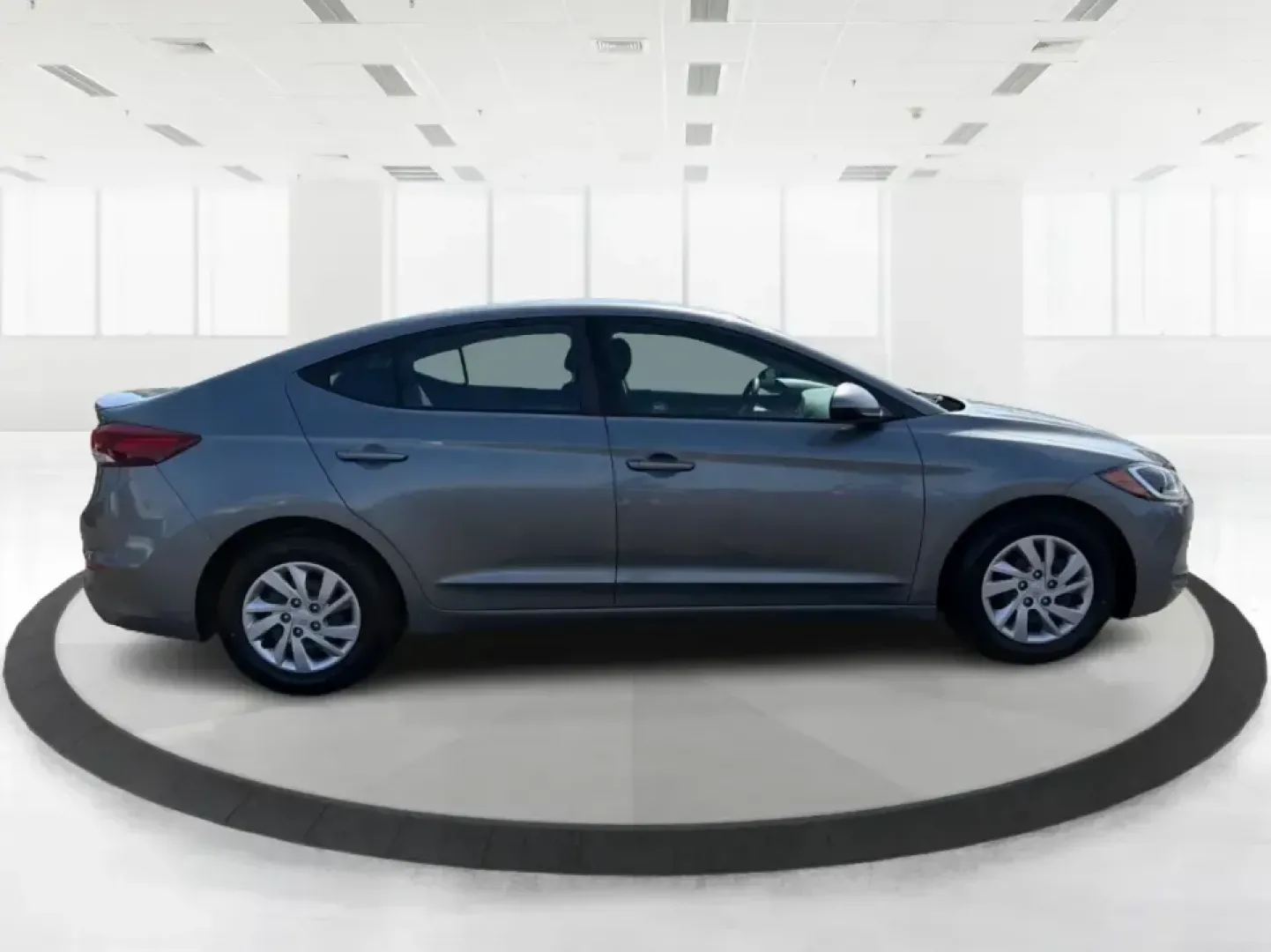 2018 Hyundai Elantra SE (KMHD74LF2JU) with an Nu 2L I-4 DOHC engine, 6A transmission, located at 4508 South Dixie Dr, Moraine, OH, 45439, (937) 908-9800, 39.689976, -84.218452 - Need a dependable commuter that's easy to park downtown, comfortable for I-75 and SR-725 drives, and efficient enough for everyday errands from Moraine to Dayton? This 2018 Hyundai Elantra SE in Galactic Gray Metallic is a smart, budget-friendly sedan built for real life-work runs, school drop-offs, - Photo#1