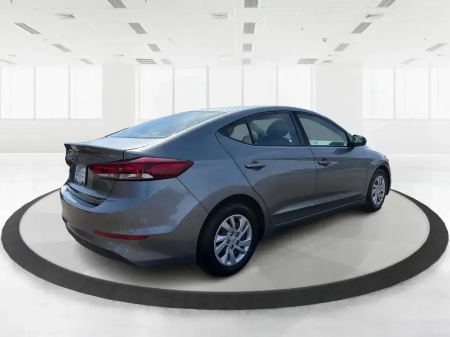 2018 Hyundai Elantra SE (KMHD74LF2JU) with an Nu 2L I-4 DOHC engine, 6A transmission, located at 4508 South Dixie Dr, Moraine, OH, 45439, (937) 908-9800, 39.689976, -84.218452 - Need a dependable commuter that's easy to park downtown, comfortable for I-75 and SR-725 drives, and efficient enough for everyday errands from Moraine to Dayton? This 2018 Hyundai Elantra SE in Galactic Gray Metallic is a smart, budget-friendly sedan built for real life-work runs, school drop-offs, - Photo#2