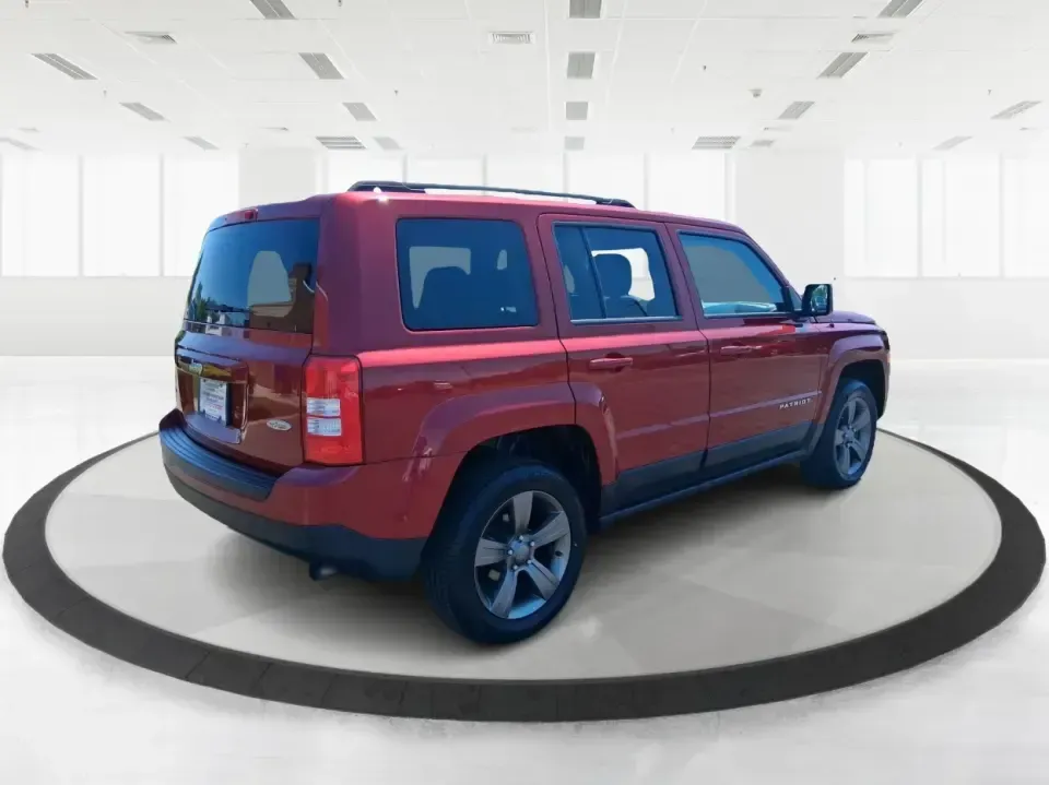2015 Jeep Patriot High Altitude Edition (1C4NJRFB0FD) with an 2.4L I-4 DOHC engine, located at 1099 N County Rd 25A , Troy, OH, 45373, (937) 908-9800, 40.057079, -84.212883 - Picture your next Ohio weekend: loading up for a road trip to Hocking Hills, heading to a kids' tournament at Duke Park, or navigating winter backroads outside Troy with confidence. This **2015 Jeep Patriot High Altitude Edition** is the kind of SUV that fits real life-practical for daily errands, c - Photo#2