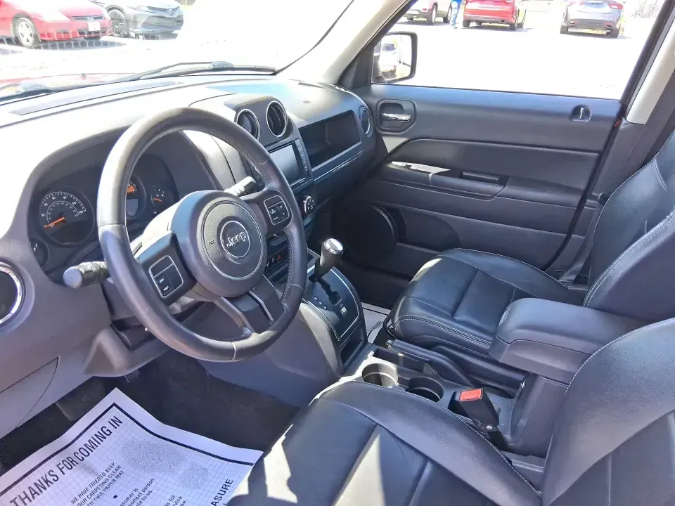 2015 Jeep Patriot High Altitude Edition (1C4NJRFB0FD) with an 2.4L I-4 DOHC engine, located at 1099 N County Rd 25A , Troy, OH, 45373, (937) 908-9800, 40.057079, -84.212883 - Picture your next Ohio weekend: loading up for a road trip to Hocking Hills, heading to a kids' tournament at Duke Park, or navigating winter backroads outside Troy with confidence. This **2015 Jeep Patriot High Altitude Edition** is the kind of SUV that fits real life-practical for daily errands, c - Photo#9