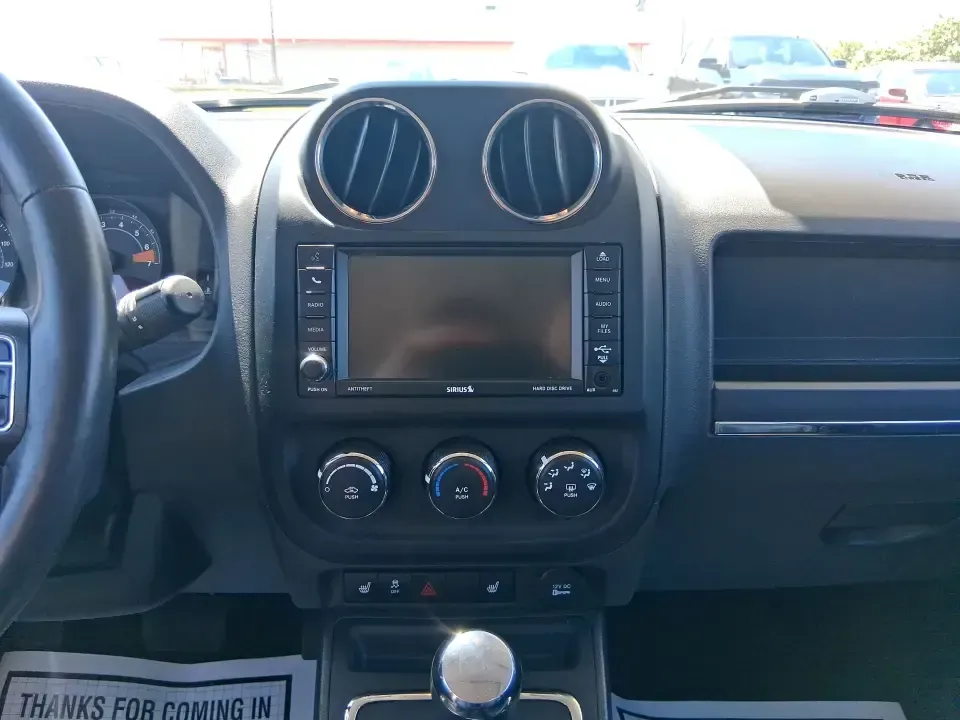 2015 Jeep Patriot High Altitude Edition (1C4NJRFB0FD) with an 2.4L I-4 DOHC engine, located at 1099 N County Rd 25A , Troy, OH, 45373, (937) 908-9800, 40.057079, -84.212883 - Picture your next Ohio weekend: loading up for a road trip to Hocking Hills, heading to a kids' tournament at Duke Park, or navigating winter backroads outside Troy with confidence. This **2015 Jeep Patriot High Altitude Edition** is the kind of SUV that fits real life-practical for daily errands, c - Photo#13