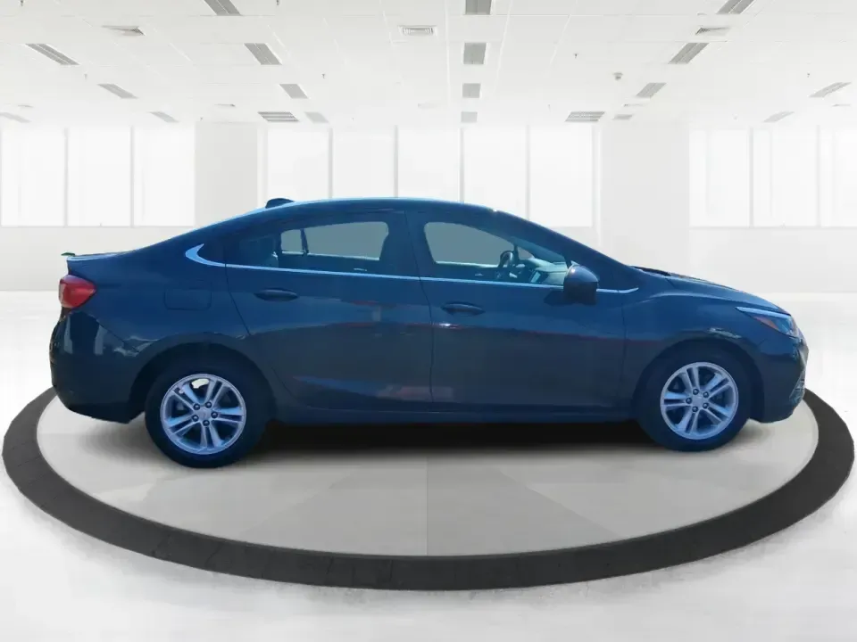 2018 Chevrolet Cruze LT Auto (1G1BE5SM2J7) with an 1.4L L4 DOHC 16V TURBO engine, 6A transmission, located at 4508 South Dixie Dr, Moraine, OH, 45439, (937) 908-9800, 39.689976, -84.218452 - Need a smart, fuel-friendly ride for the daily commute from Moraine to Downtown Dayton, quick errands along South Dixie Drive, or weekend plans out toward Carillon Historical Park? This 2018 Chevrolet Cruze LT Auto is the kind of practical sedan that fits real life: comfortable for five, easy to par- Photo#1