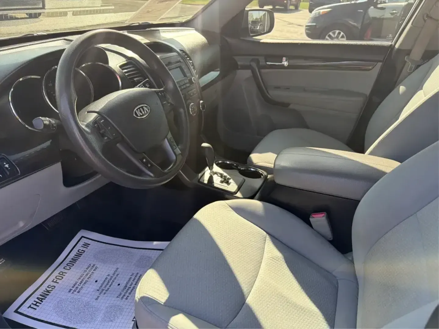 2013 Kia Sorento LX (5XYKT3A12DG) with an 2.4L I-4 DOHC engine, 6-Speed Automatic transmission, located at 8750 N County Rd 25A, Piqua, OH, 45356, (937) 908-9800, 40.164391, -84.232513 - Need one SUV that can handle the school run, a long commute up I75, and a weekend getaway to Indian Lake without blowing your budget? This 2013 Kia Sorento LX in Satin Metal is a practical, road-trip-ready SUV that's sized for real life-easy to park, comfortable for passengers, and versatile enough - Photo#9