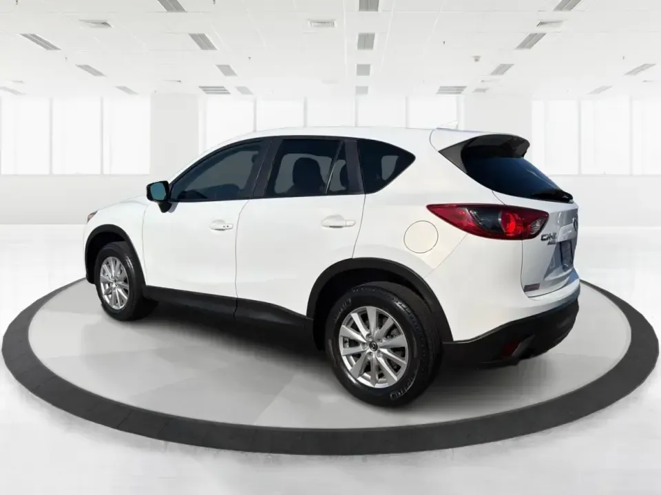 2016 Mazda CX-5 Touring (JM3KE4CYXG0) with an SKYACTIV-G 2.5L I-4 gasoline direct injection engine, 6-Speed Automatic transmission, located at 1184 Kauffman Ave, Fairborn, OH, 45324, (937) 908-9800, 39.807072, -84.030914 - Pack up the kids, load the groceries, or point the nose toward a weekend road trip-this 2016 Mazda CX-5 Touring is the kind of SUV that fits real life in Piqua. With confident all-weather capability and a comfortable, well-equipped cabin, it's a smart choice for commuters running up and down I75, fa - Photo#4