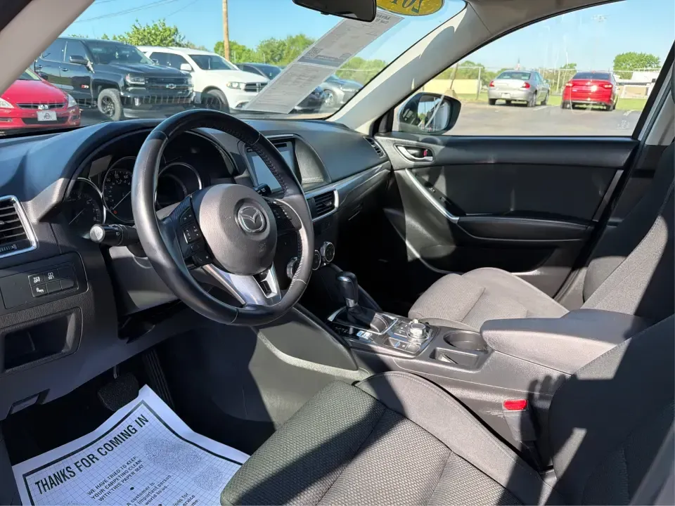 2016 Mazda CX-5 Touring (JM3KE4CYXG0) with an SKYACTIV-G 2.5L I-4 gasoline direct injection engine, 6-Speed Automatic transmission, located at 1184 Kauffman Ave, Fairborn, OH, 45324, (937) 908-9800, 39.807072, -84.030914 - Pack up the kids, load the groceries, or point the nose toward a weekend road trip-this 2016 Mazda CX-5 Touring is the kind of SUV that fits real life in Piqua. With confident all-weather capability and a comfortable, well-equipped cabin, it's a smart choice for commuters running up and down I75, fa - Photo#9
