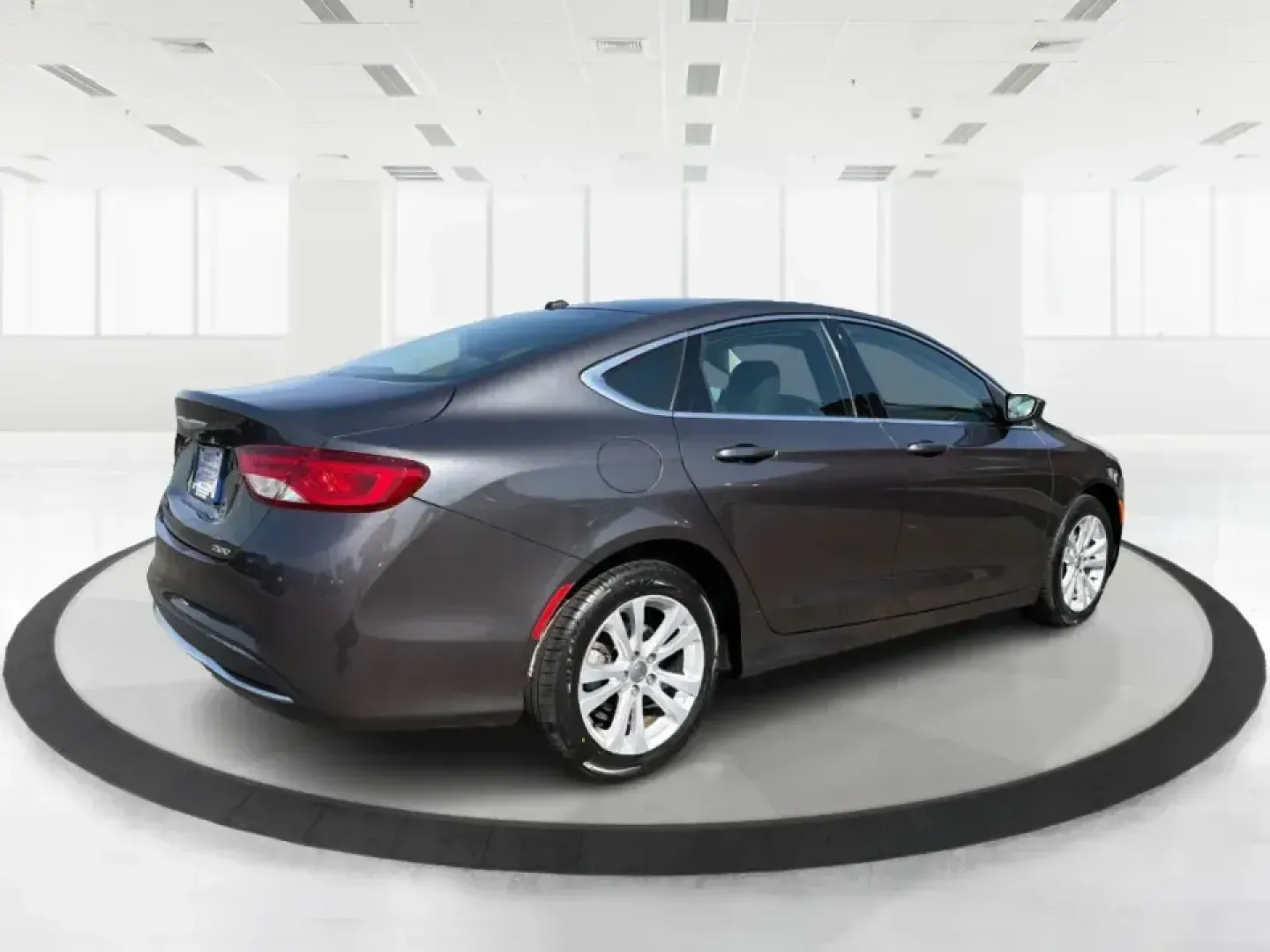 2015 Chrysler 200 Limited (1C3CCCAB6FN) with an 2.4L L4 DOHC 16V engine, 9-Speed Automatic transmission, located at 1099 N County Rd 25A , Troy, OH, 45373, (937) 908-9800, 40.057079, -84.212883 - Picture your next week: an easy I-75 commute, a comfortable run to Meijer, and a weekend cruise past the Miami County Fairgrounds-without stressing about how you'll get approved. This 2015 Chrysler 200 Limited is built for real life in Troy, Ohio: smooth, quiet, and efficient enough for daily drivin - Photo#2
