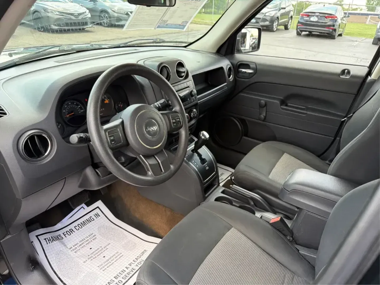 2014 Jeep Patriot Sport (1C4NJPBB0ED) with an 2.4L L4 DOHC 16V engine, located at 880 E. National Road, Vandalia, OH, 45377, (937) 908-9800, 39.891918, -84.183594 - Weekend getaways to the MetroParks, daily commutes down I75, or school-dropoff runs around Vandalia-this 2014 Jeep Patriot Sport is built for the kind of real-life driving that mixes practicality with a little adventure. Finished in Black Clearcoat with a versatile SUV body style, it's an easy fit f - Photo#9