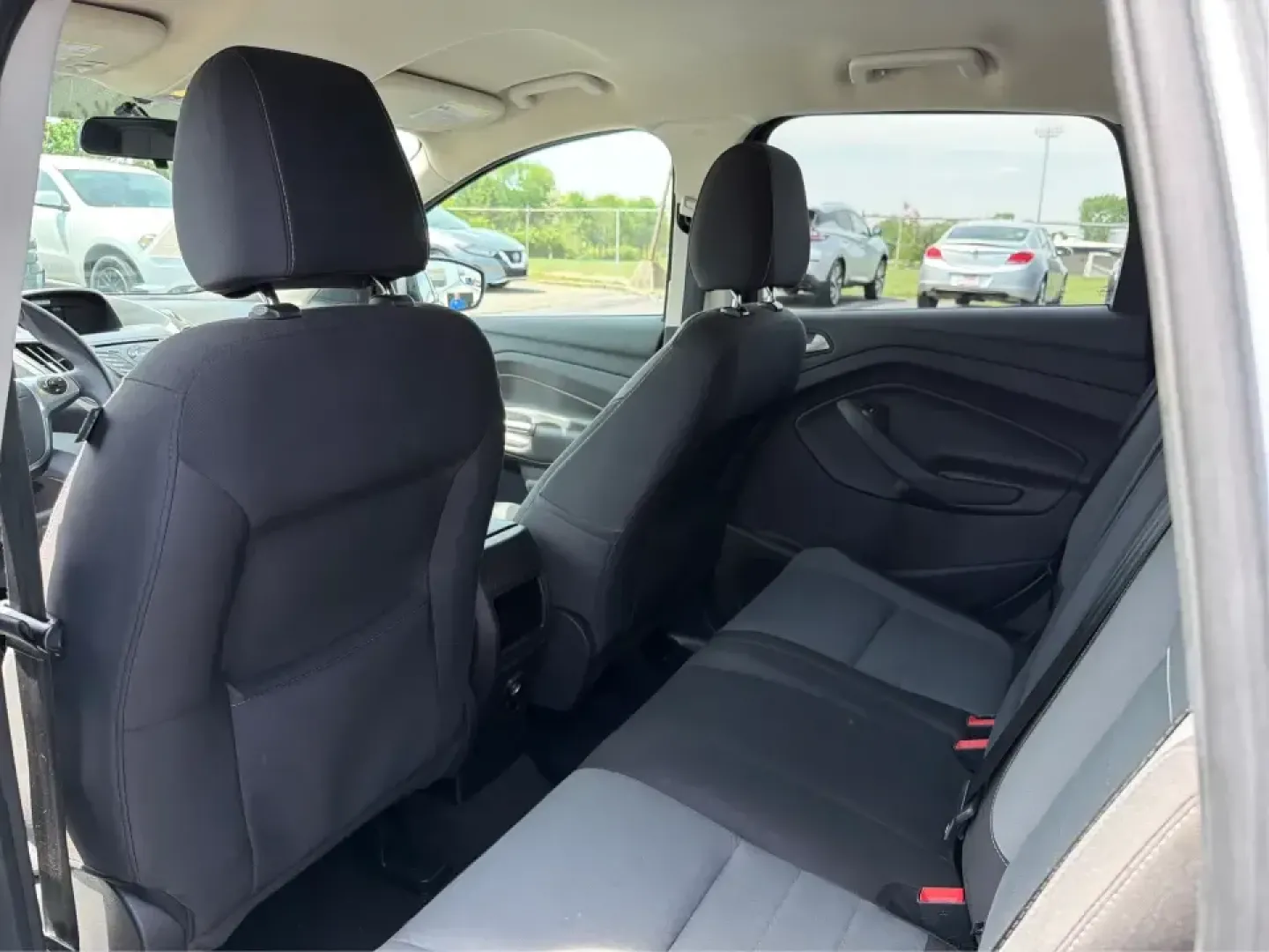 2015 Ford Escape SE (1FMCU9G98FU) with an 2.0L L4 DOHC 16V engine, 6-Speed Automatic transmission, located at 1099 N County Rd 25A , Troy, OH, 45373, (937) 908-9800, 40.057079, -84.212883 - Weekday commutes down I75, school drop-offs around Troy City Schools, and spontaneous weekend trips to Charleston Falls Preserve all get easier when you have an SUV that's the right size, the right power, and the right fit for your budget. This 2015 Ford Escape SE in Ingot Silver is built for real-l - Photo#10