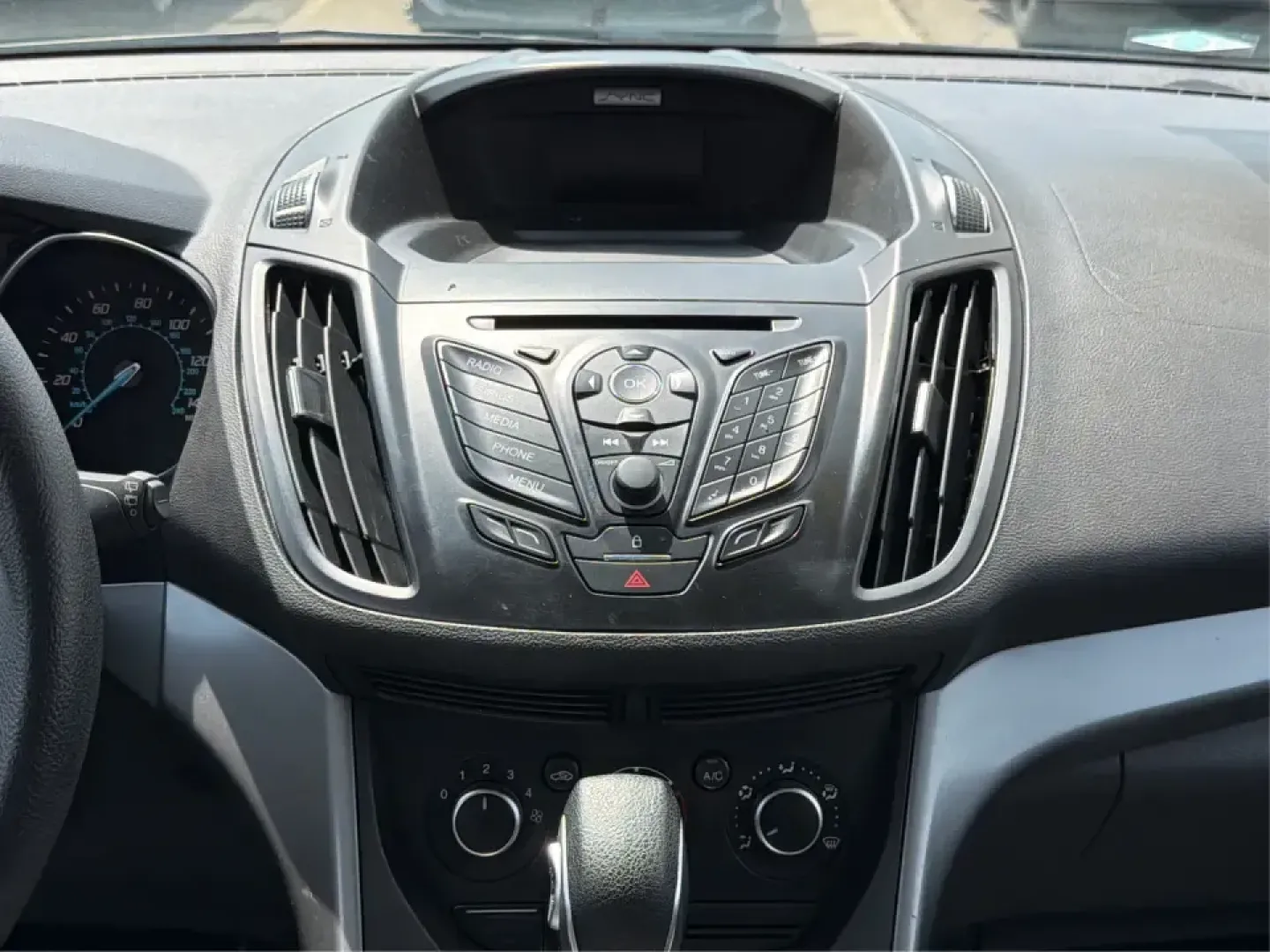 2015 Ford Escape SE (1FMCU9G98FU) with an 2.0L L4 DOHC 16V engine, 6-Speed Automatic transmission, located at 1099 N County Rd 25A , Troy, OH, 45373, (937) 908-9800, 40.057079, -84.212883 - Weekday commutes down I75, school drop-offs around Troy City Schools, and spontaneous weekend trips to Charleston Falls Preserve all get easier when you have an SUV that's the right size, the right power, and the right fit for your budget. This 2015 Ford Escape SE in Ingot Silver is built for real-l - Photo#13