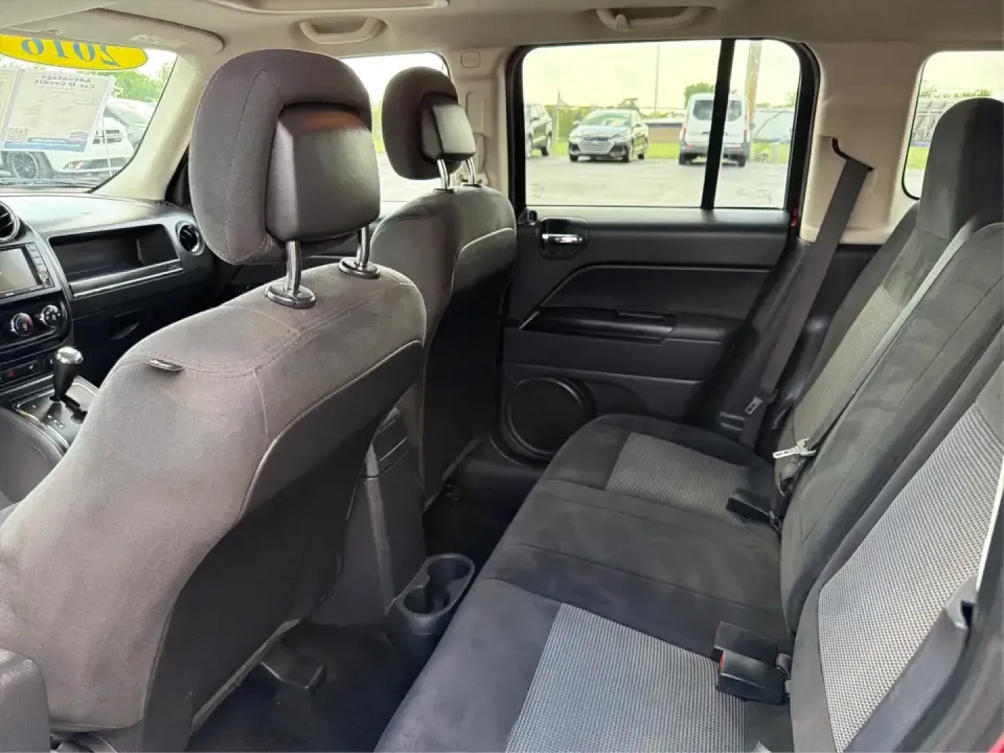 2016 Jeep Patriot Latitude (1C4NJRFB0GD) with an 2.4L I-4 DOHC engine, located at 8750 N County Rd 25A, Piqua, OH, 45356, (937) 908-9800, 40.164391, -84.232513 - Weekend escapes to Indian Lake, snowy morning commutes up I75, or everyday school-and-grocery runs around Miami County-this 2016 Jeep Patriot Latitude is built for the kind of Ohio life that doesn't slow down when the weather turns. With confident 4WD/AWD capability and SUV practicality, it's a smar - Photo#10