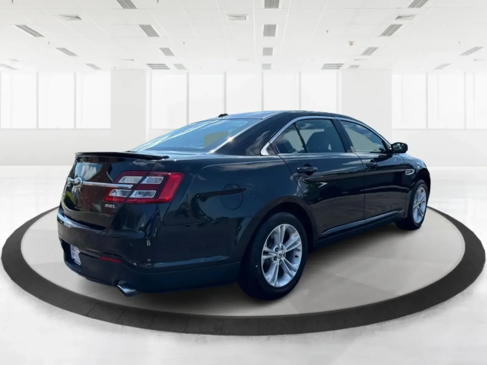 2013 Ford Taurus SEL (1FAHP2E87DG) with an EcoBoost 2L I-4 gasoline direct injection engine, located at 1099 N County Rd 25A , Troy, OH, 45373, (937) 908-9800, 40.057079, -84.212883 - ### Discover Your Next Adventure with the 2013 Ford Taurus SEL from Advantage Car and Credit!<br /> <br /> Are you seeking a reliable and stylish sedan for your daily commute, family road trips, or weekend adventures? Look no further! The 2013 Ford Taurus SEL, available at Advantage Car and Credit i - Photo#2