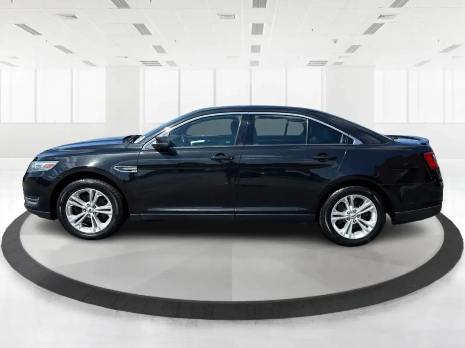 2013 Ford Taurus SEL (1FAHP2E87DG) with an EcoBoost 2L I-4 gasoline direct injection engine, located at 1099 N County Rd 25A , Troy, OH, 45373, (937) 908-9800, 40.057079, -84.212883 - ### Discover Your Next Adventure with the 2013 Ford Taurus SEL from Advantage Car and Credit!<br /> <br /> Are you seeking a reliable and stylish sedan for your daily commute, family road trips, or weekend adventures? Look no further! The 2013 Ford Taurus SEL, available at Advantage Car and Credit i - Photo#5