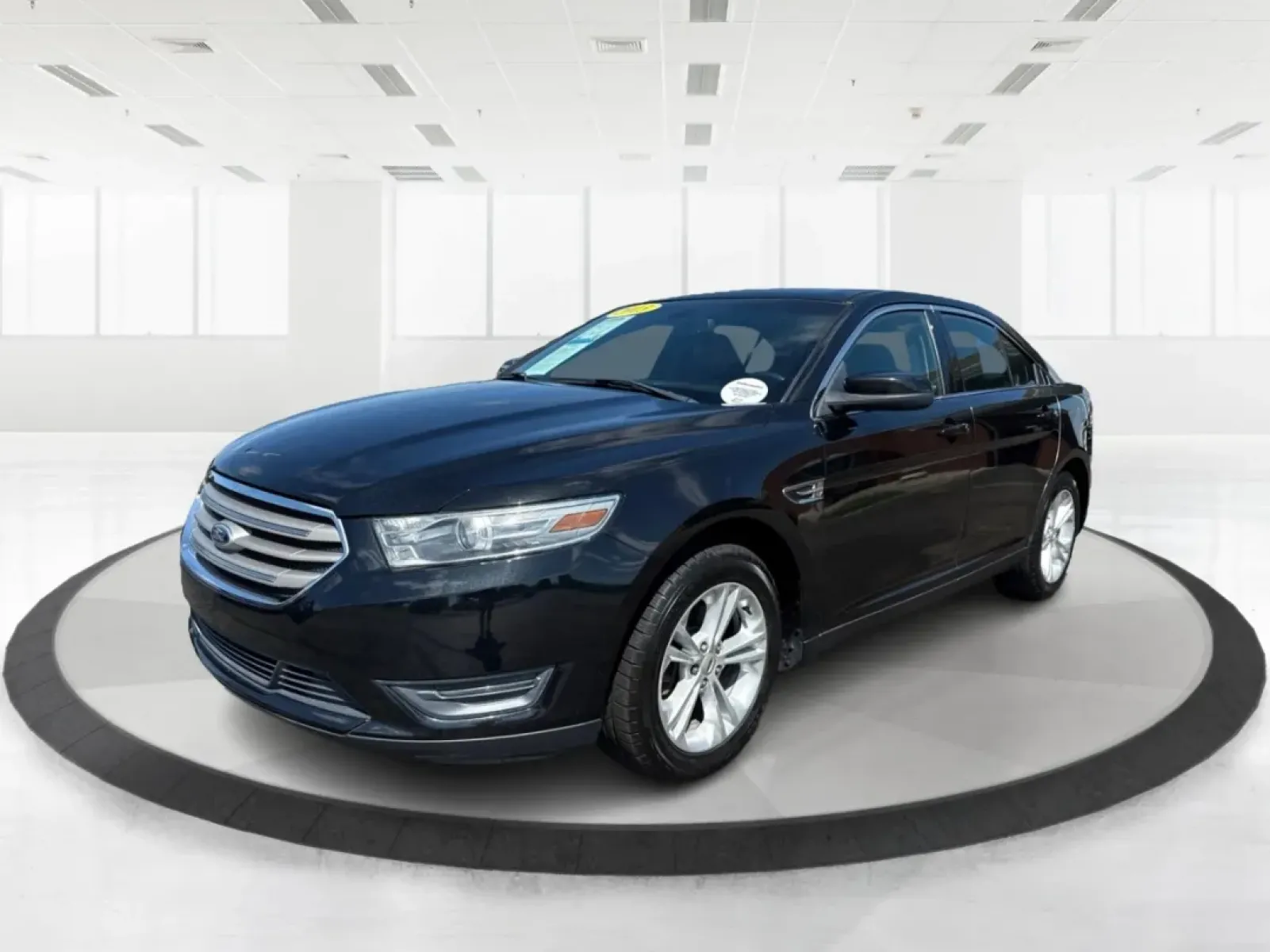 2013 Ford Taurus SEL (1FAHP2E87DG) with an EcoBoost 2L I-4 gasoline direct injection engine, located at 1099 N County Rd 25A , Troy, OH, 45373, (937) 908-9800, 40.057079, -84.212883 - ### Discover Your Next Adventure with the 2013 Ford Taurus SEL from Advantage Car and Credit!<br /> <br /> Are you seeking a reliable and stylish sedan for your daily commute, family road trips, or weekend adventures? Look no further! The 2013 Ford Taurus SEL, available at Advantage Car and Credit i - Photo#8