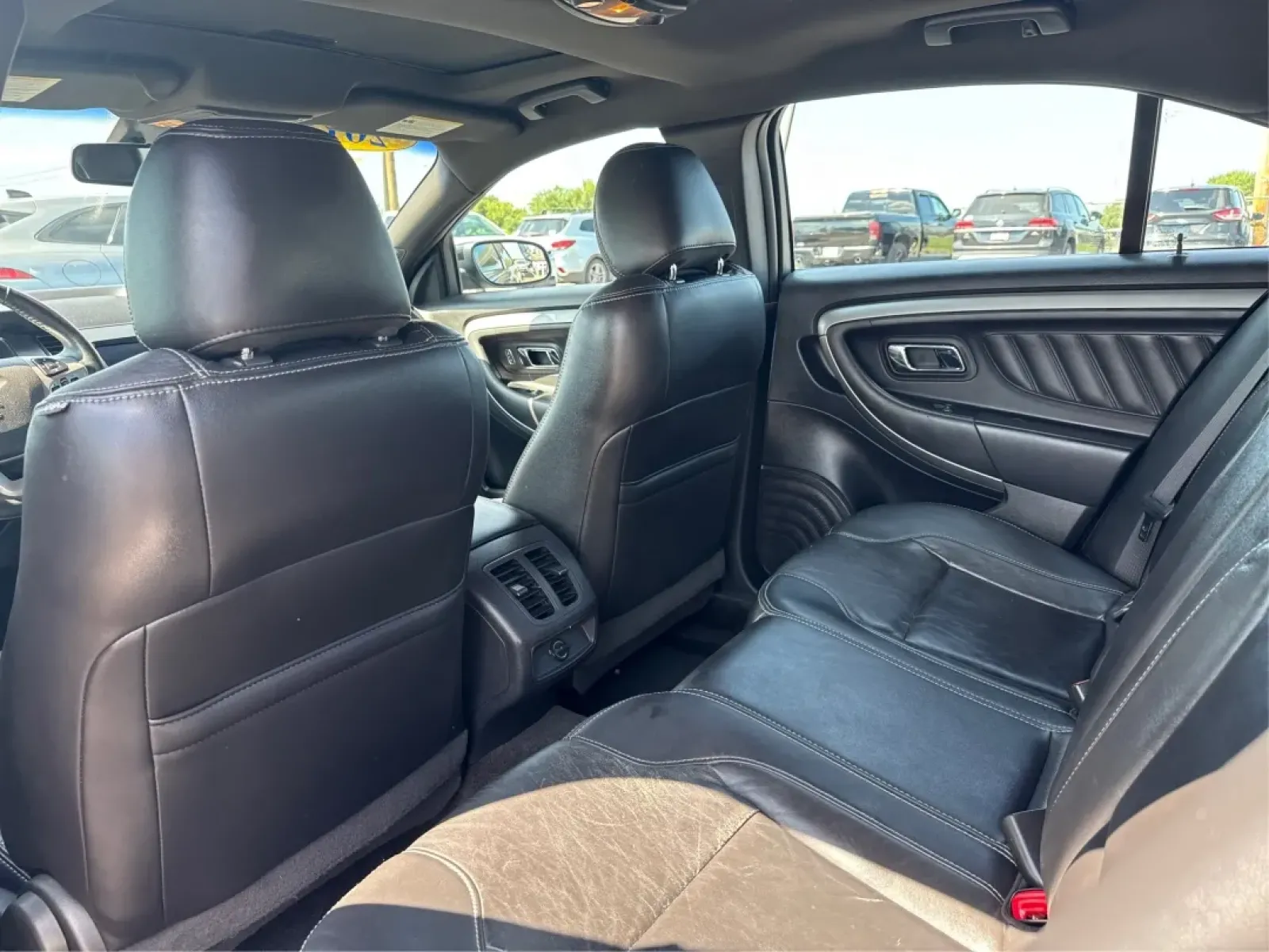2013 Ford Taurus SEL (1FAHP2E87DG) with an EcoBoost 2L I-4 gasoline direct injection engine, located at 1099 N County Rd 25A , Troy, OH, 45373, (937) 908-9800, 40.057079, -84.212883 - ### Discover Your Next Adventure with the 2013 Ford Taurus SEL from Advantage Car and Credit!<br /> <br /> Are you seeking a reliable and stylish sedan for your daily commute, family road trips, or weekend adventures? Look no further! The 2013 Ford Taurus SEL, available at Advantage Car and Credit i - Photo#10