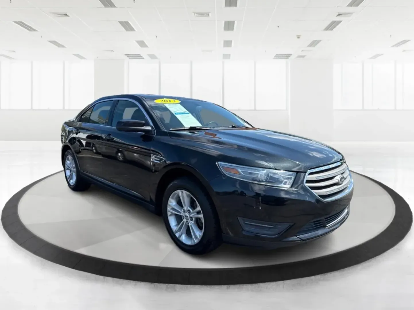 2013 Ford Taurus SEL (1FAHP2E87DG) with an EcoBoost 2L I-4 gasoline direct injection engine, located at 1099 N County Rd 25A , Troy, OH, 45373, (937) 908-9800, 40.057079, -84.212883 - ### Discover Your Next Adventure with the 2013 Ford Taurus SEL from Advantage Car and Credit!<br /> <br /> Are you seeking a reliable and stylish sedan for your daily commute, family road trips, or weekend adventures? Look no further! The 2013 Ford Taurus SEL, available at Advantage Car and Credit i - Photo#0