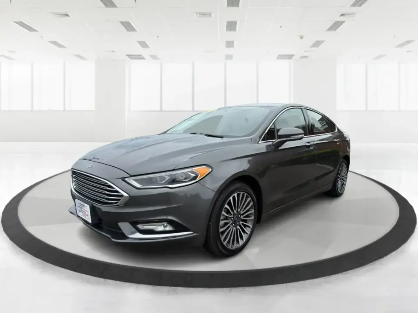 2017 Ford Fusion SE (3FA6P0H98HR) with an 2.0L L4 DOHC 16V engine, 6A transmission, located at 4508 South Dixie Dr, Moraine, OH, 45439, (937) 908-9800, 39.689976, -84.218452 - Picture your next week: a smooth, quiet commute down South Dixie Drive, quick errands to the Dayton Mall area, and a comfortable weekend drive toward Carillon Historical Park or a Reds day trip-without feeling like you're overpaying for a sedan that can't keep up. This 2017 Ford Fusion SE in sleek M - Photo#8
