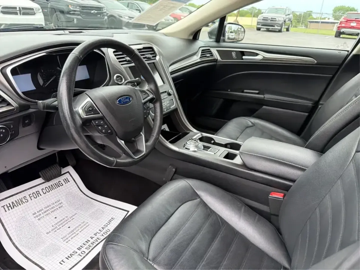 2017 Ford Fusion SE (3FA6P0H98HR) with an 2.0L L4 DOHC 16V engine, 6A transmission, located at 4508 South Dixie Dr, Moraine, OH, 45439, (937) 908-9800, 39.689976, -84.218452 - Picture your next week: a smooth, quiet commute down South Dixie Drive, quick errands to the Dayton Mall area, and a comfortable weekend drive toward Carillon Historical Park or a Reds day trip-without feeling like you're overpaying for a sedan that can't keep up. This 2017 Ford Fusion SE in sleek M - Photo#9