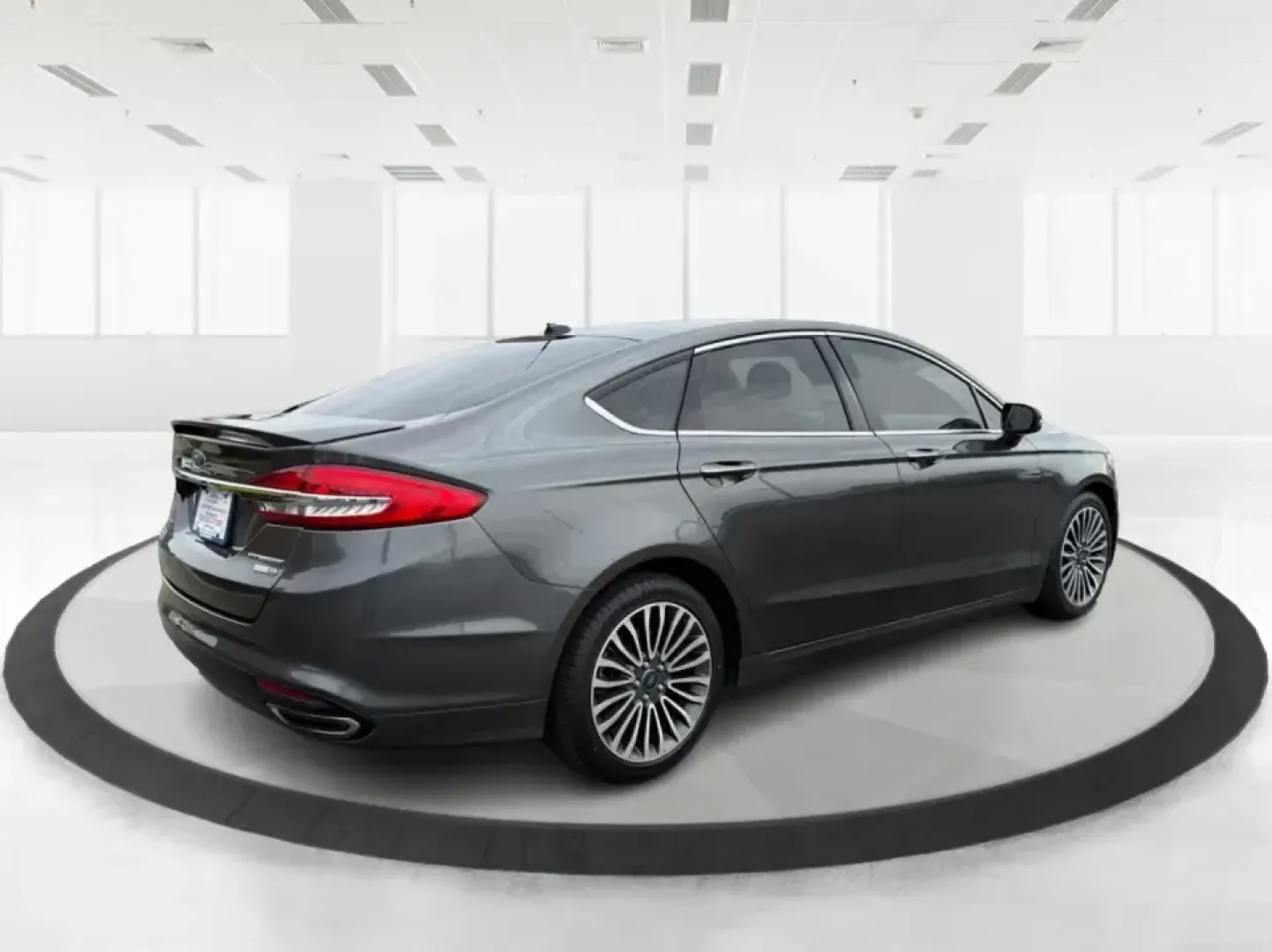 2018 Ford Fusion Titanium AWD (3FA6P0D9XJR) with an 2.0L L4 DOHC 16V engine, 6-Speed Automatic transmission, located at 8750 N County Rd 25A, Piqua, OH, 45356, (937) 908-9800, 40.164391, -84.232513 - Picture a comfortable, capable sedan that makes daily commutes down I70 feel easy, keeps weekend plans on track, and still looks sharp pulling into dinner in nearby Huber Heights or downtown Dayton. This **2018 Ford Fusion Titanium AWD** is built for real-life driving in Ohio-whether you're navigati - Photo#2