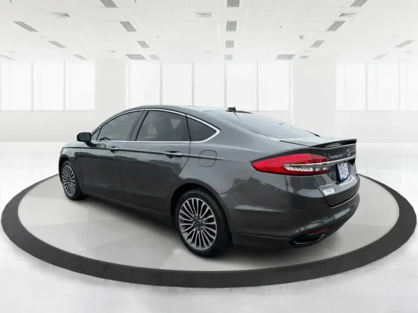 2018 Ford Fusion Titanium AWD (3FA6P0D9XJR) with an 2.0L L4 DOHC 16V engine, 6-Speed Automatic transmission, located at 8750 N County Rd 25A, Piqua, OH, 45356, (937) 908-9800, 40.164391, -84.232513 - Picture a comfortable, capable sedan that makes daily commutes down I70 feel easy, keeps weekend plans on track, and still looks sharp pulling into dinner in nearby Huber Heights or downtown Dayton. This **2018 Ford Fusion Titanium AWD** is built for real-life driving in Ohio-whether you're navigati - Photo#4