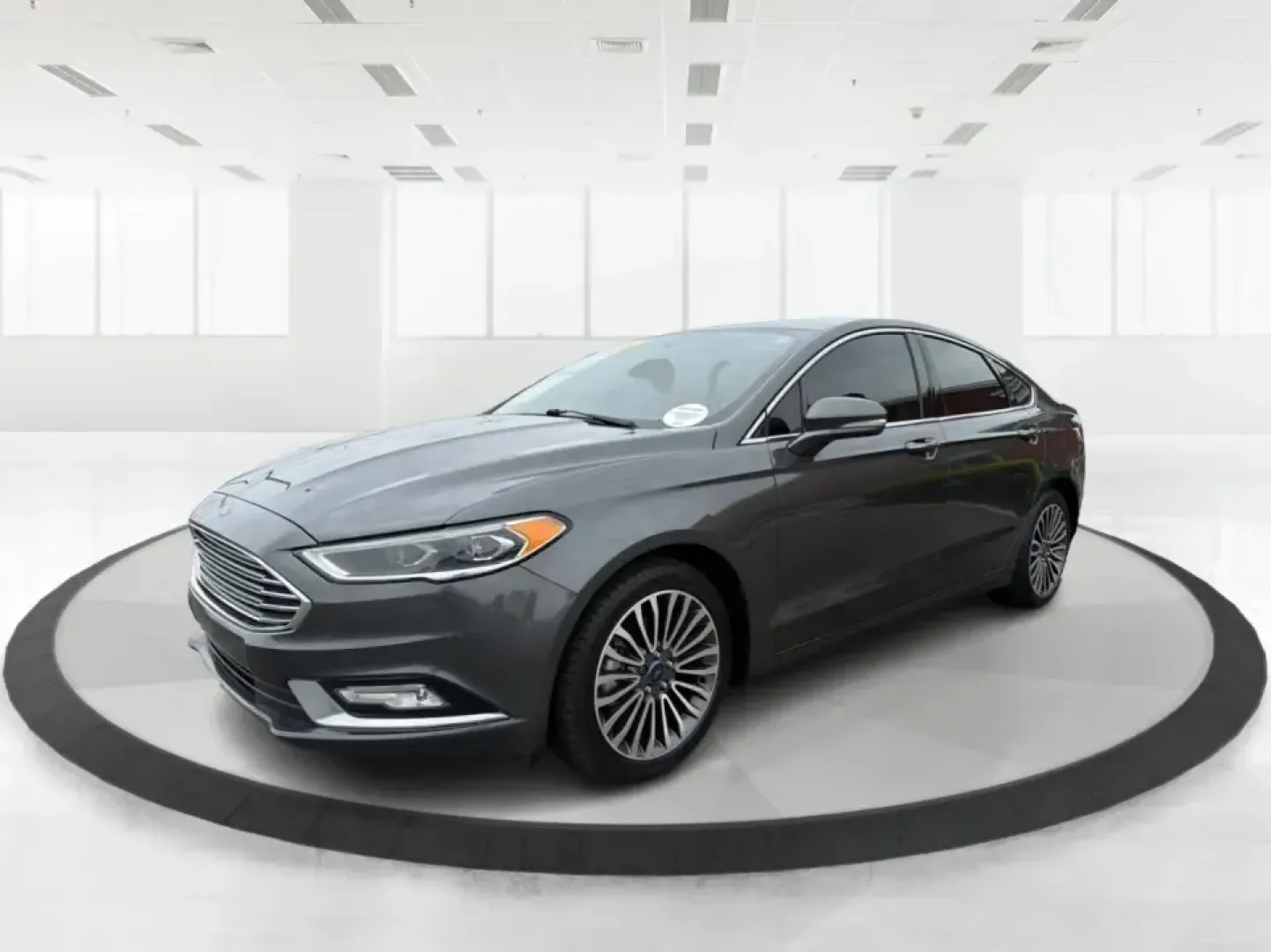 2018 Ford Fusion Titanium AWD (3FA6P0D9XJR) with an 2.0L L4 DOHC 16V engine, 6-Speed Automatic transmission, located at 8750 N County Rd 25A, Piqua, OH, 45356, (937) 908-9800, 40.164391, -84.232513 - Picture a comfortable, capable sedan that makes daily commutes down I70 feel easy, keeps weekend plans on track, and still looks sharp pulling into dinner in nearby Huber Heights or downtown Dayton. This **2018 Ford Fusion Titanium AWD** is built for real-life driving in Ohio-whether you're navigati - Photo#8