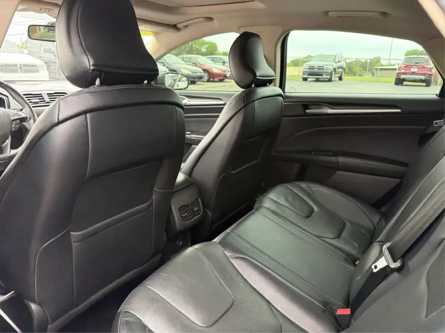 2018 Ford Fusion Titanium AWD (3FA6P0D9XJR) with an 2.0L L4 DOHC 16V engine, 6-Speed Automatic transmission, located at 8750 N County Rd 25A, Piqua, OH, 45356, (937) 908-9800, 40.164391, -84.232513 - Picture a comfortable, capable sedan that makes daily commutes down I70 feel easy, keeps weekend plans on track, and still looks sharp pulling into dinner in nearby Huber Heights or downtown Dayton. This **2018 Ford Fusion Titanium AWD** is built for real-life driving in Ohio-whether you're navigati - Photo#10