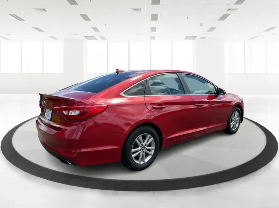 2017 Hyundai Sonata SE (5NPE24AF8HH) with an 2.4L L4 DOHC 16V engine, 7-Speed Automatic transmission, located at 8750 N County Rd 25A, Piqua, OH, 45356, (937) 908-9800, 40.164391, -84.232513 - Ready for a dependable commuter that still looks sharp pulling into work, school pickup, or a weekend dinner in town? This Scarlet Red 2017 Hyundai Sonata SE is a practical, comfortable sedan that fits real-life schedules in Piqua, Ohio-whether you're cruising up N County Rd 25A, heading toward I75 - Photo#2