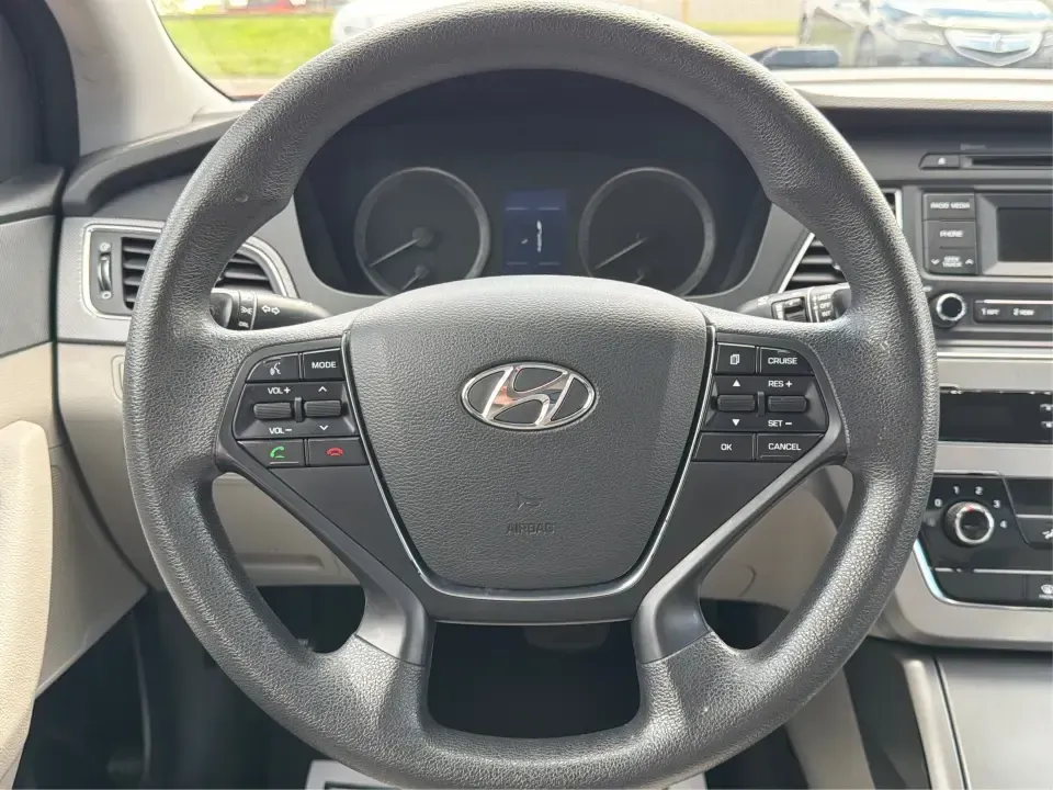 2017 Hyundai Sonata SE (5NPE24AF8HH) with an 2.4L L4 DOHC 16V engine, 7-Speed Automatic transmission, located at 8750 N County Rd 25A, Piqua, OH, 45356, (937) 908-9800, 40.164391, -84.232513 - Ready for a dependable commuter that still looks sharp pulling into work, school pickup, or a weekend dinner in town? This Scarlet Red 2017 Hyundai Sonata SE is a practical, comfortable sedan that fits real-life schedules in Piqua, Ohio-whether you're cruising up N County Rd 25A, heading toward I75 - Photo#16