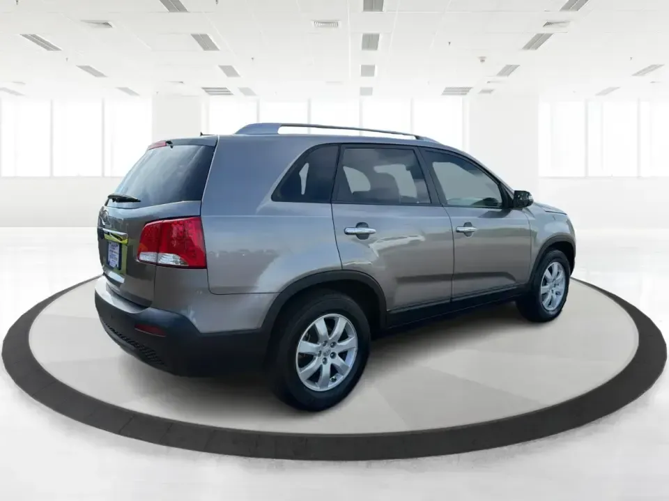 2012 Kia Sorento LX (5XYKT3A64CG) with an 2.4L I-4 gasoline direct injection engine, 6-Speed Automatic transmission, located at 401 Woodman Dr, Riverside, OH, 45431, (937) 908-9800, 39.760899, -84.123421 - Picture your next week going smoother: school drop-offs, the daily commute, grocery runs, and a last-minute weekend road trip-all in one comfortable SUV that fits real life without feeling like a compromise. This 2012 Kia Sorento LX in Satin Metal is the kind of practical, do-it-all sport utility th - Photo#2