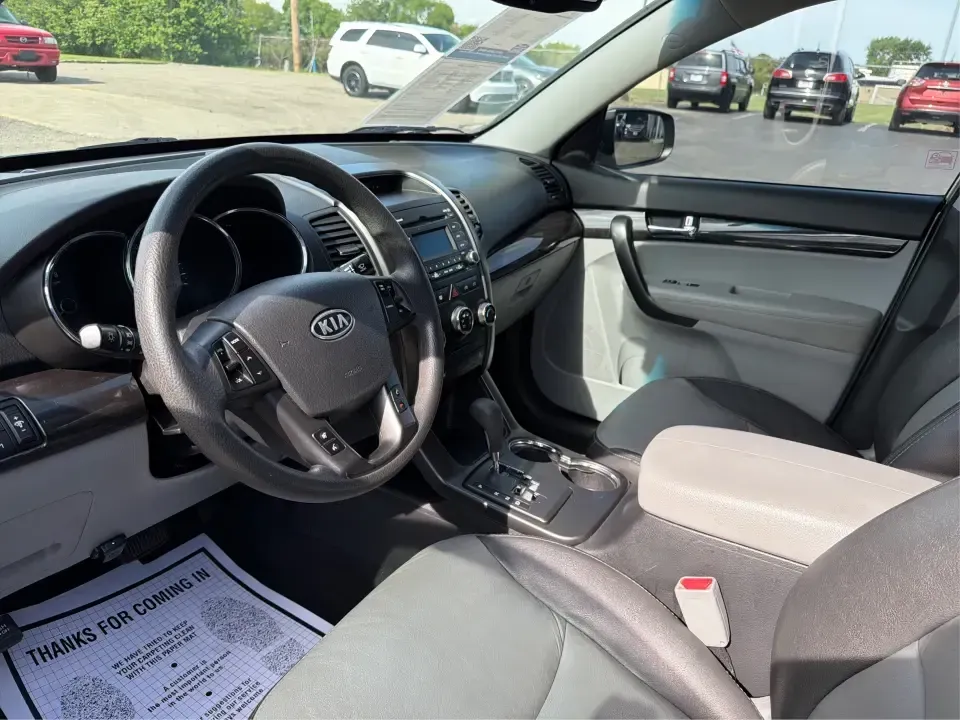 2012 Kia Sorento LX (5XYKT3A64CG) with an 2.4L I-4 gasoline direct injection engine, 6-Speed Automatic transmission, located at 401 Woodman Dr, Riverside, OH, 45431, (937) 908-9800, 39.760899, -84.123421 - Picture your next week going smoother: school drop-offs, the daily commute, grocery runs, and a last-minute weekend road trip-all in one comfortable SUV that fits real life without feeling like a compromise. This 2012 Kia Sorento LX in Satin Metal is the kind of practical, do-it-all sport utility th - Photo#9